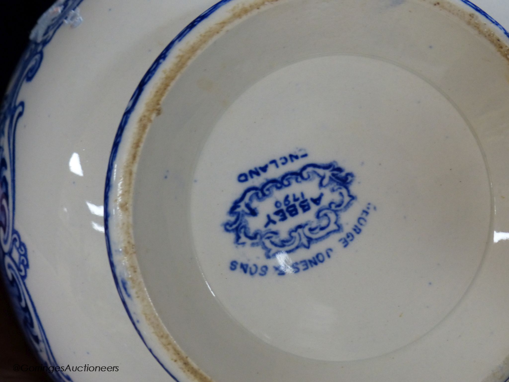 A Royal Doulton 'Burns' plate, no.D6344, diameter 26cm, and a George Jones & Sons Abbey pattern blue and white bowl